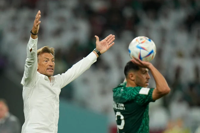 Saudi Arabia’s head coach Herve Renard gives instructions from the side line during their World Cup group C match against Poland and, at the Education City Stadium in Al Rayyan on Saturday. (AP)