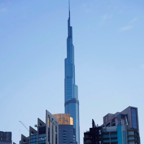 The high-rise 8 Boulevard Walk, bottom right, shows fire damage with the Burj Khalifa, the world's tallest building, seen behind it in Dubai, UAE on Nov. 7, 2022. (AP)