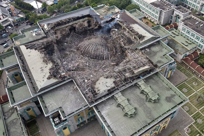 This aerial picture taken on October 20, 2022 shows the smouldering remains of the collapsed dome of the Islamic Centre mosque in Jakarta. (AFP)