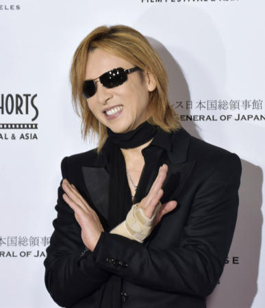 Rock band X Japan drummer Yoshiki has performed at Madison Square Garden and Carnegie Hall, and composed a song for Japan's emperor. (Kyodo News via AP)
