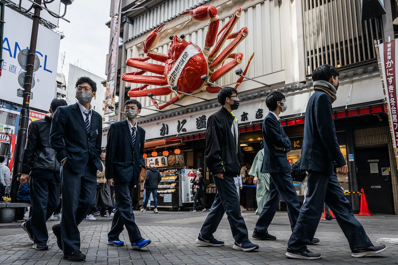In Tokyo, 10,454 new cases of novel coronavirus infection were reported Sunday, with the daily count rising by 108 from a week before. (AFP)