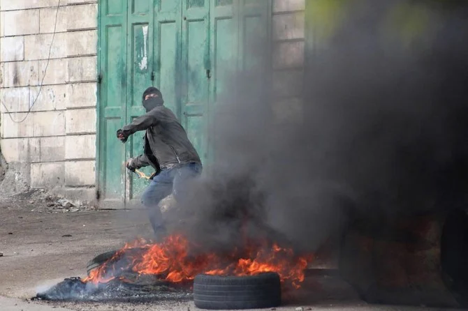 The military has been conducting months of arrest raids in the West Bank, prompted by a spate of Palestinian attacks against Israelis in the spring that killed 19 people. (AFP)