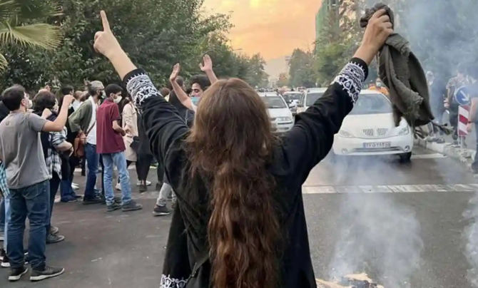 A protest in Tehran days after the death of Mahsa Amini. One medic said he treated a woman ‘deliberately’ shot in the genitals and thighs. (Shutterstock)