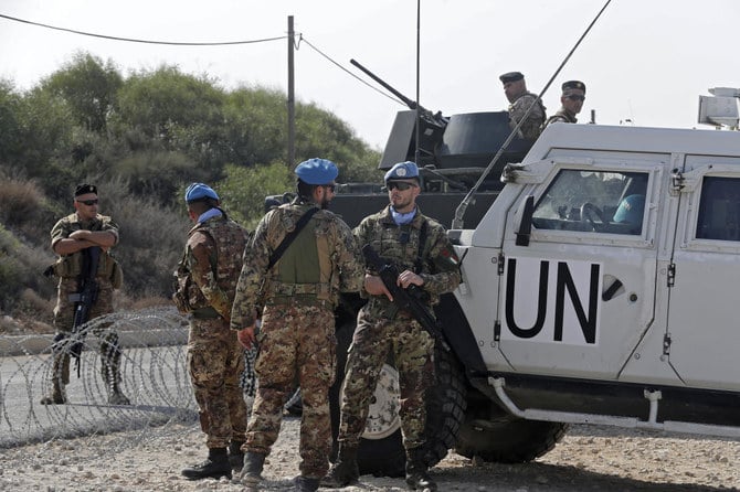 Lebanese army soldiers and peacekeepers of the United Nations Interim Force In Lebanon (UNIFIL) are stationed in Lebanon's southern Naqoura along the border with northern Israel's Rosh HaNikra on October 27, 2022. (File/AFP)