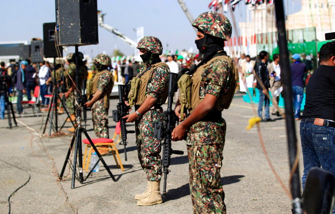 Yemeni fighters, loyal to the Shiite Houthi movement, secure a rally in the capital Sanaa. (AFP file photo)