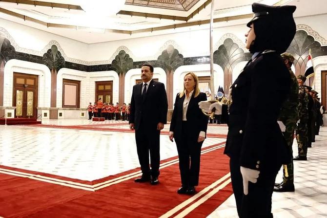 Prime minister Mohammed Shia Al-Sudani receives his Italian counterpart Giorgia Meloni in Baghdad at the start of her official visit to Iraq on Dec. 23, 2022. (Iraqi prime minister’s office/AFP)