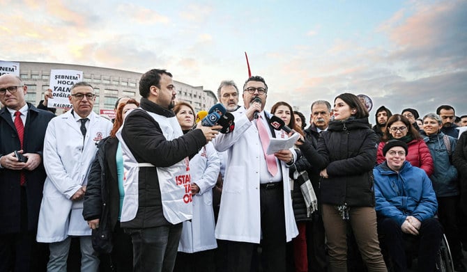 Ali Ihsan Okten, vice president of Turkish Doctor’s Union, addresses the media in Istanbul during the trial of Sebnem Korur Fincanci detained over chemical arms comment and ‘terrorist propaganda’ charges. (AFP)