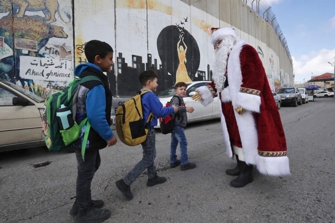 ‘From Bethlehem to the world; the spirit of Christmas brings us together’. (AFP)