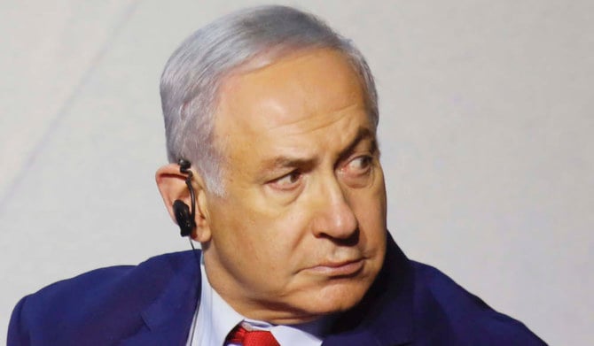 Israeli Prime Minister Benjamin Netanyahu listens during the 5th trilateral summit with Creece and Cyprus in Beersheba, Israel, Thursday, Dec. 20, 2018. (AP)