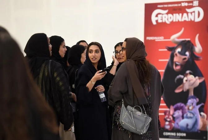 Saudi women gather at a cinema in Riyadh Park Mall after its opening for the general public on April 30, 2018. (AFP/File Photo)