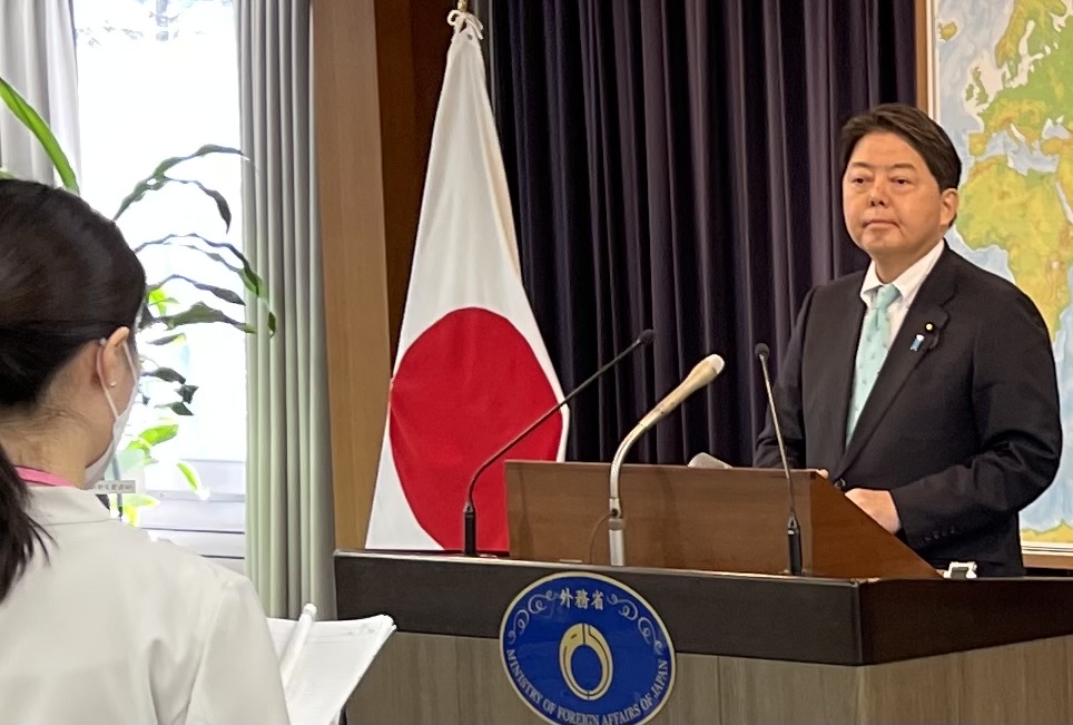 Foreign Minister Hayashi listens to a question at a press conference held at the ministry building on December 27. (ANJ) 