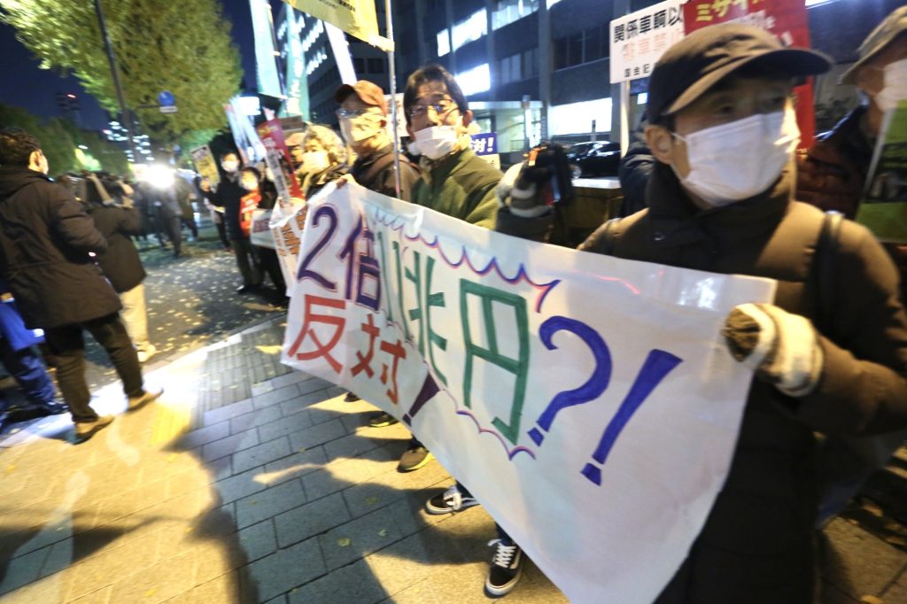 The demonstrators held up signs and chanted slogans calling for an end to military expansion and the development program for new long-range missiles. (ANJ/ Pierre Boutier)
