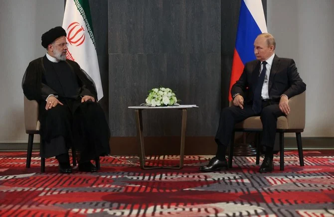 Russian President Vladimir Putin meets with his Iranian counterpart Ebrahim Raisi during the SCO summit: Sept., 2022 (File/AFP)