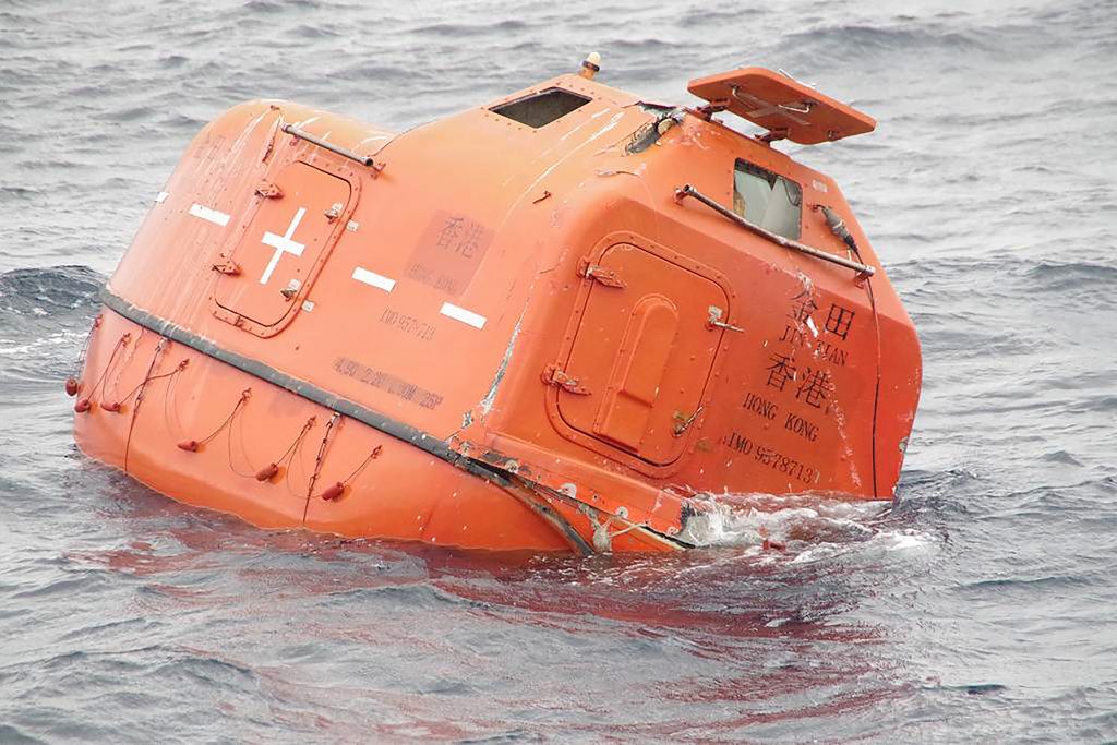 This handout photo taken and released on January 25, 2023 by the 7th Regional Coast Guard headquarters of the Japan Coast Guard shows a lifeboat from the Jin Tian cargo ship floating at sea, after the Hong Kong registered vessel sank between South Korea's southern island of Jeju and Japan's southwestern Nagasaki prefecture. (AFP)