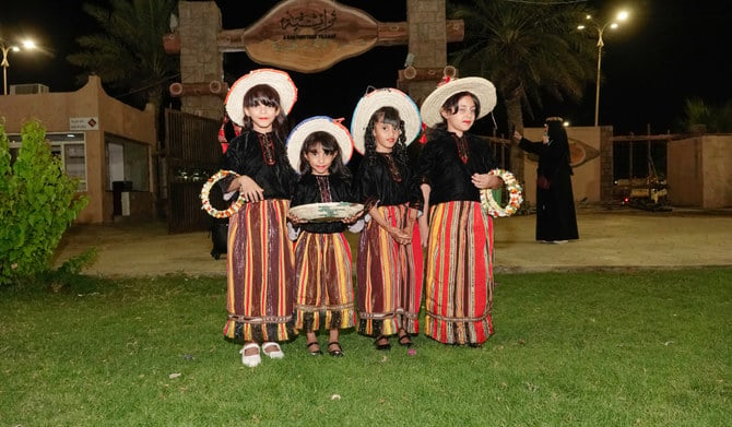 When visiting the Heritage village, the visitors are greeted by local girls who welcome them and give them a rose collar. (AN photos by Huda Bashatah)