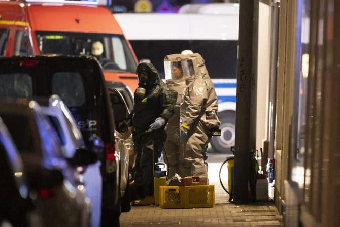 Substances found during the search are examined in Castrop-Rauxel, Sunday, Jan.8, 2023. (AP)