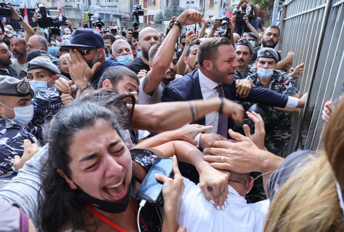 Angry Jordanians gather in the town of Salt on March 13, 2021 to protest the deaths of least six COVID-19 patients of a hospital that ran out of oxygen. (AFP file)