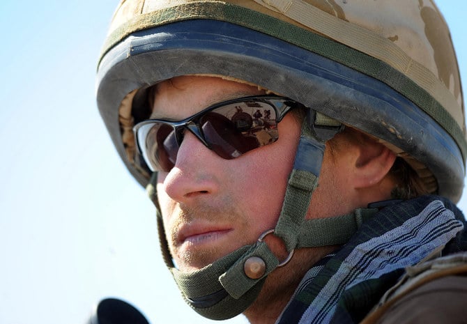 Prince Harry sitting in his position on a Spartan armoured vehicle, in the desert in Helmand province in Southern Afghanistan in 2008.(AFP)