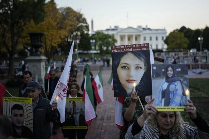 Iranian-Americans and their supporters hold a vigil in support of protestors in Iran and to mark 40 days since the death in Iran of Masha Amini, in Lafayette Square near the White House October 26, 2022 in Washington, DC. (Getty via AFP)