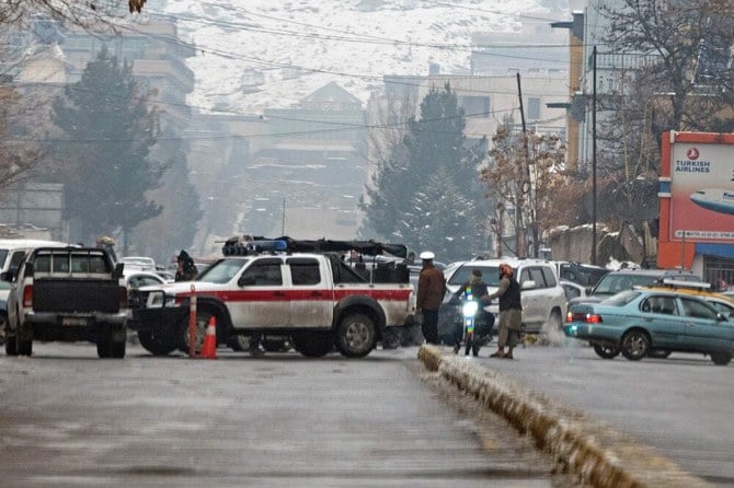 Taliban security forces block a road after a suicide blast near Afghanistan’s foreign ministry at the Zanbaq Square in Kabul on January 11, 2023. (AFP)