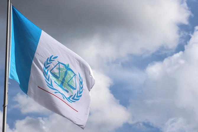 A picture taken on August 18, 2020 shows the flag of the UN-backed Special Tribunal for Lebanon fluttering over the building of the STL at Leidschendam, Netherlands. (AFP)