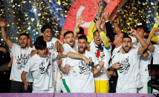 Iraqi players celebrate winning the Arabian Gulf Cup. (Twitter/@AGCFF)