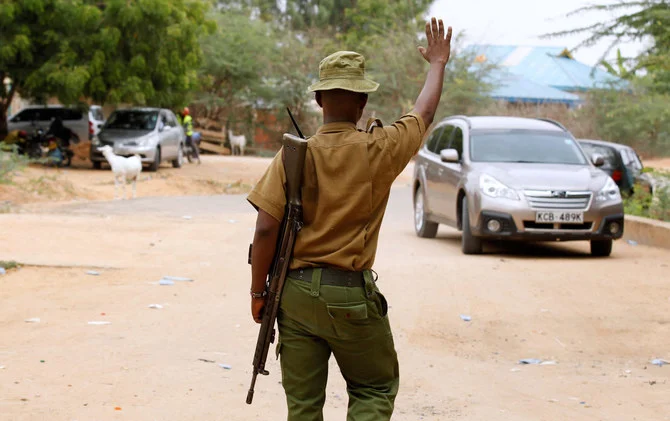 FILE PHOTO: A police officer stops a car at the entrance of the Garissa University College in Kenya's northeast town of Garissa, January 11, 2016. (Reuters)