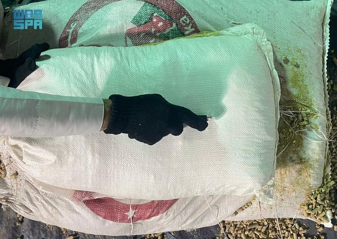The drugs were found hidden in a shipment of cattle feed at Jeddah Islamic Port sent to recipients from Egypt and Jordan. (SPA)