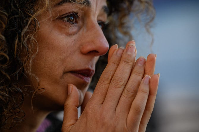Iranian-US women’s rights activist Masih Alinejad becomes emotional during an interview in New York on October 6, 2022. (AFP)