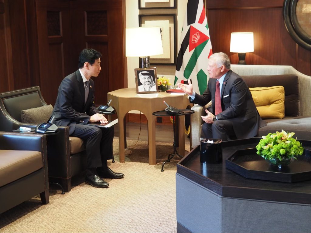 Jordan's King Abdullah II and Japanese Economy Minister Yasutoshi Nishimura during a meeting at the Al Husseiniya Palace, in Amman, Jordan. (Twitter/@nishy03)