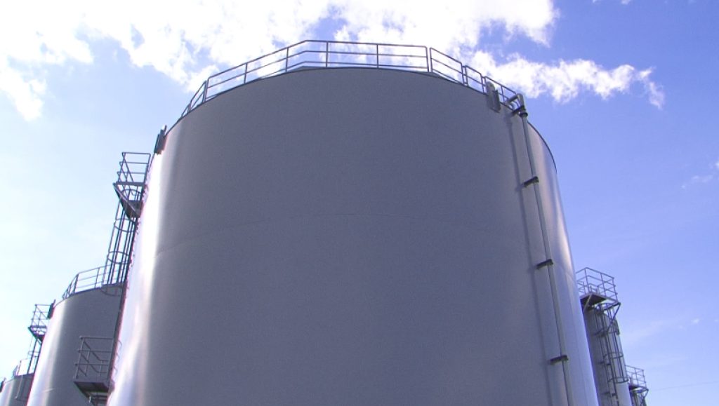 A Tokyo Electric Power Company worker inspects the base of a water tank where radioactive water is stored at the crippled Fukushima Nuclear Plant. (File photo- ANJ)