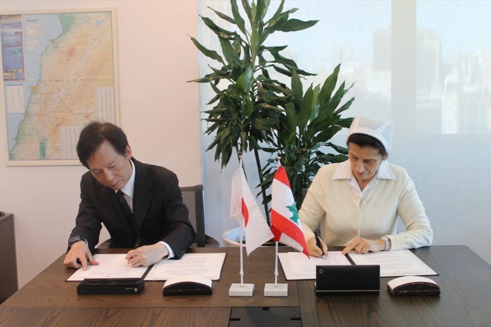 Ambassador MAGOSHI Masayuki signed a grant contract with Sister Hadia Abi Chebli. (Supplied)