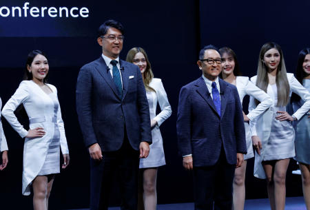 Akio Toyoda, who will become chairman of Toyota Motor Corp, and Koji Sato, who was named as a new CEO of the company, attend Tokyo Auto Salon 2023 at Makuhari Messe in Chiba, east of Tokyo, Japan January 13, 2023. (Reuters)