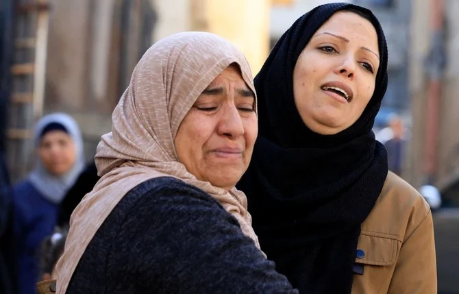 Relatives mourn at the funeral of one of the Palestinians killed during an Israeli raid on the Jenin refugee camp in the occupied West Bank on January 26, 2023. (AFP)