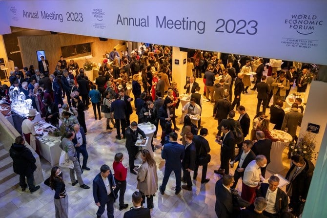 Participants take part in a welcome reception on the opening day of the World Economic Forum (WEF) annual meeting in Davos (AFP)