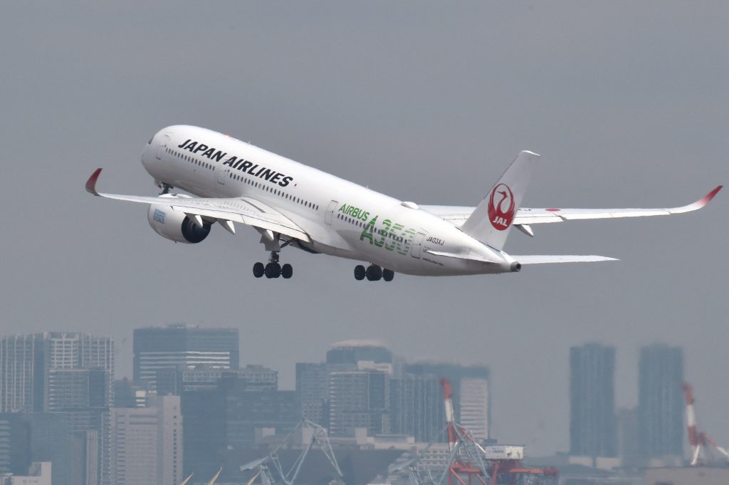 Japanese airlines will let each passenger decide whether to wear a face mask on flights,. (AFP)