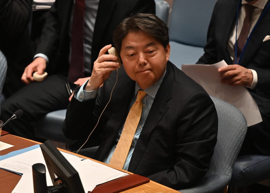 Yoshimasa Hayashi is considering attending a U.N. Security Council session on Ukraine. (AFP)