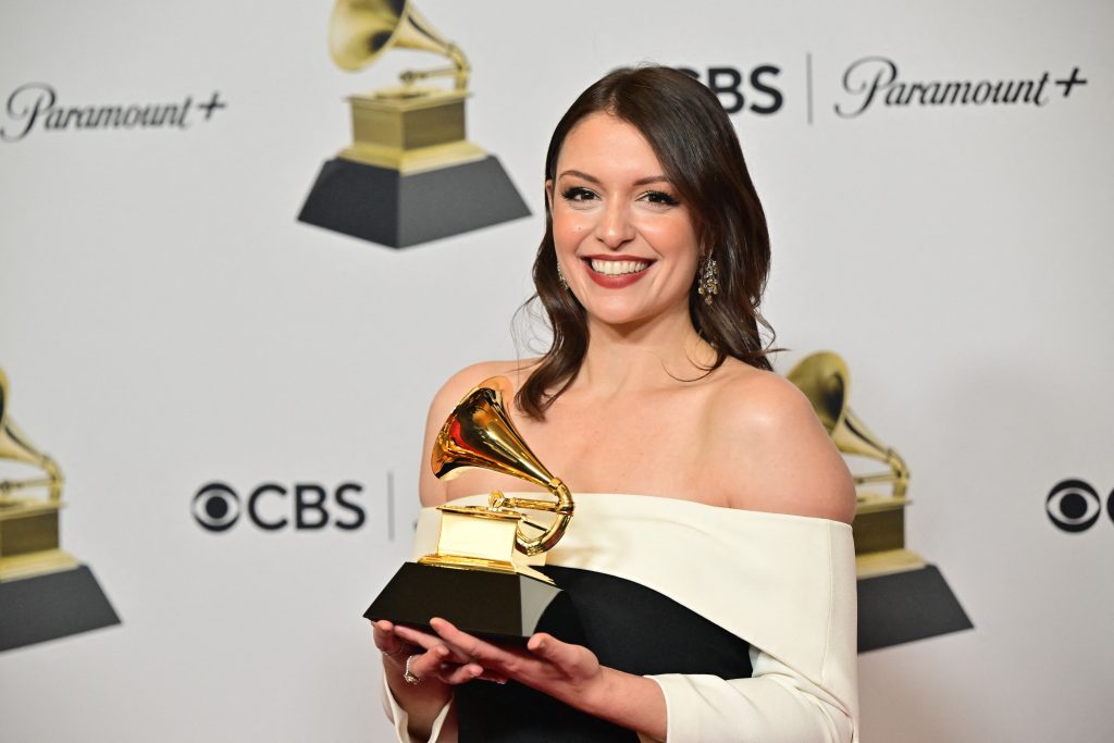 Composer Stephanie Economou holds the award for Best Score Soundtrack for Video Games and Other Interactive Media album in the press room during the 65th Annual Grammy Awards at the Crypto.com Arena in Los Angeles on February 5, 2023. (AFP)