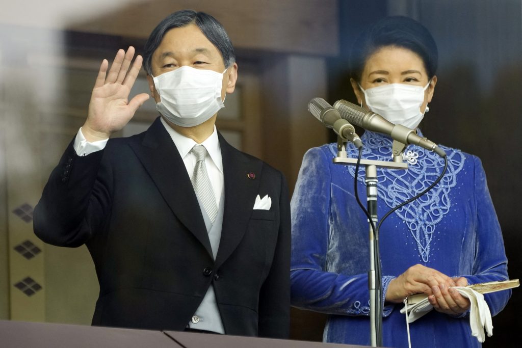 Japanese Emperor Naruhito (L) and Empress Masako greet people during his birthday celebrations at the Imperial Palace in Tokyo on February 23, 2023. (AFP)