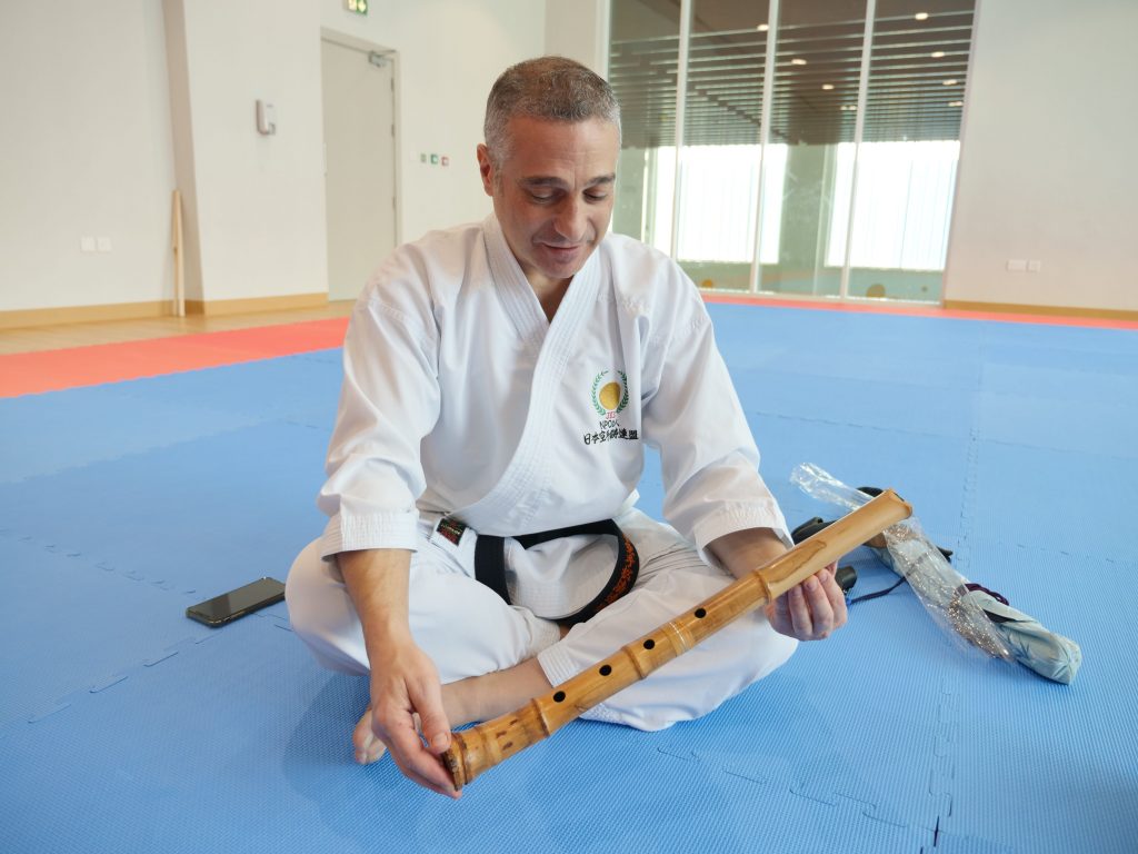Kyle Kamal Helou has resided in Japan for more than 10 consecutive years with ongoing training and teaching there for more than 20 years.