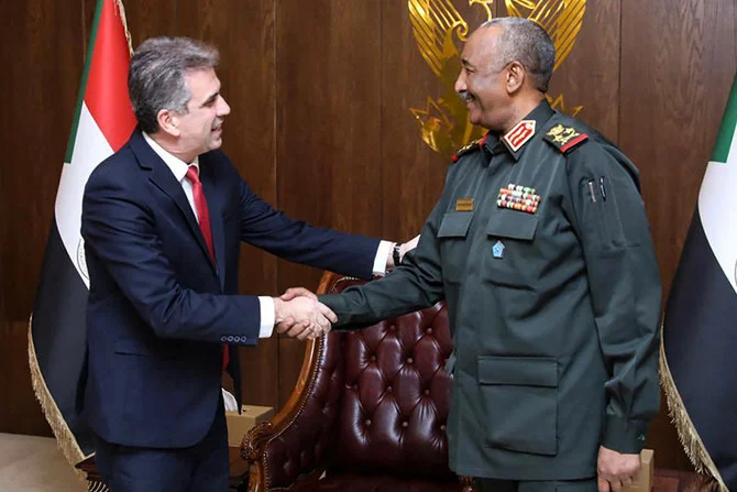 Sudan’s army chief Abdel Fattah Al-Burhan receives Israeli Foreign Minister Eli Cohen in the capital Khartoum, on February 2, 2023. (AFP)