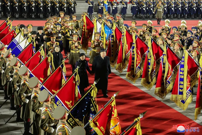 North Korean leader Kim Jong Un, his wife Ri Sol Ju and their daughter Kim Ju Ae attend a military parade to mark the 75th founding anniversary of North Korea's army in Pyongyang on Feb. 8, 2023. (KCNA via Reuters)