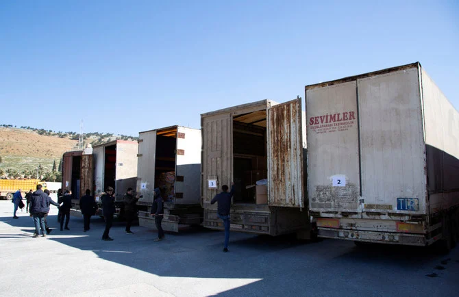 Trucks carrying humanitarian aid seen at the Bab al Hawa border crossing with Turkiye, Syria. (Reuters)