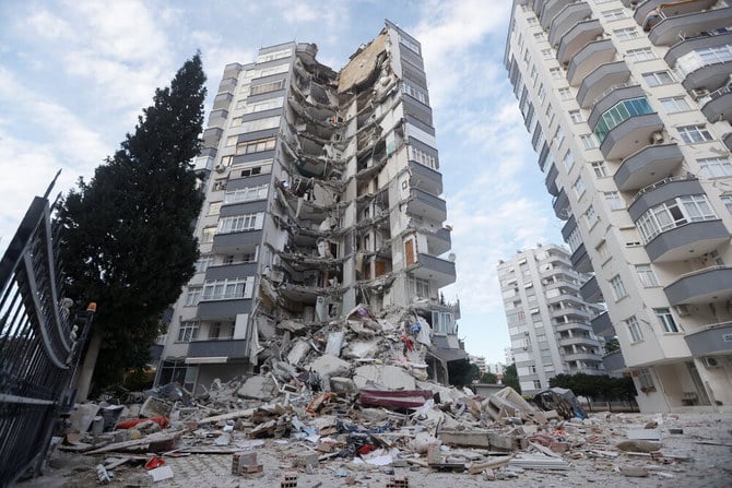 A view shows a semi collapsed building following the earthquake in Adana, Turkiye, on February 7, 2023. (Reuters)