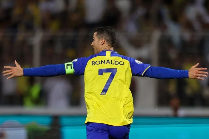 Nassr’s Portuguese forward Cristiano Ronaldo celebrates scoring his team’s fourth goal in the Saudi Pro League game against Al-Wehda, King Abdulaziz Stadium, Makkah, Feb. 9, 2023. (AFP)