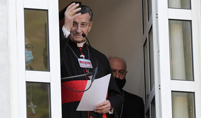 Maronite Patriarch Bechara Boutros Al-Rahi greets supporters ahead of a speech on February 27, 2021. (AFP/File)
