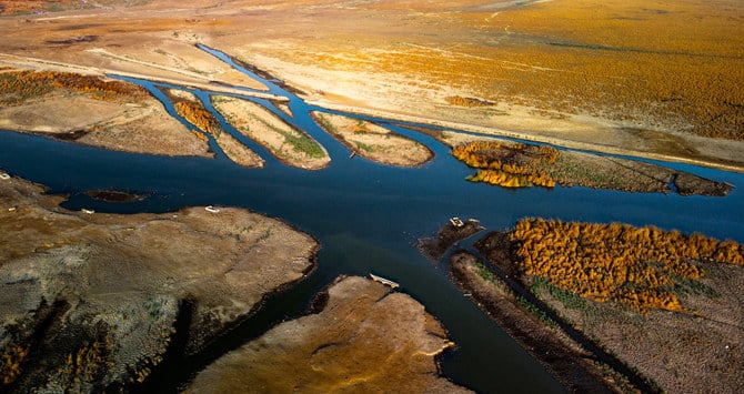 An aerial view of the drying-up marshes of Chibayish in Iraq’s southern Dhi Qar province. (AFP/File)