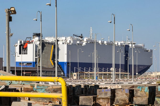 This picture taken on February 28, 2021 shows the Israeli-owned Bahamian-flagged MV Helios Ray cargo ship docked in Dubai's Port Rashid, days after it was hit by a blast in the Arabian Sea. (AFP file)