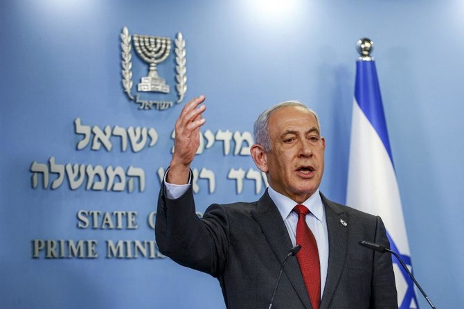 Benjamin Netanyahu, who is on trial for corruption that he denies, has said the changes are needed in order to restore balance between the government and the judiciary. (AFP)