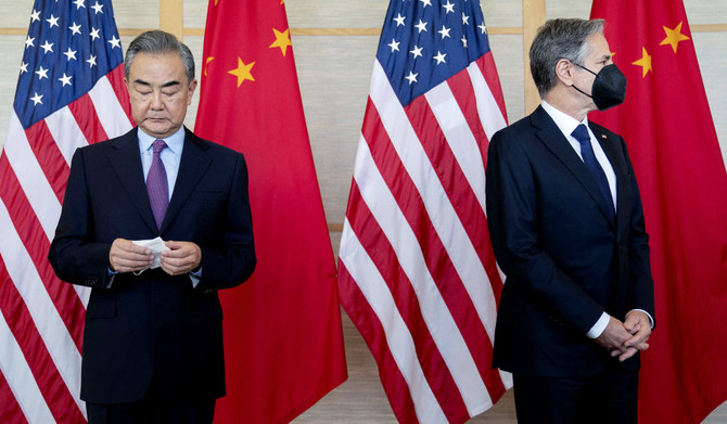 US Secretary of State Antony Blinken (R) and China's Foreign Minister Wang Yi attend a meeting in Nusa Dua on the Indonesian resort island of Bali on July 9, 2022. (AFP)